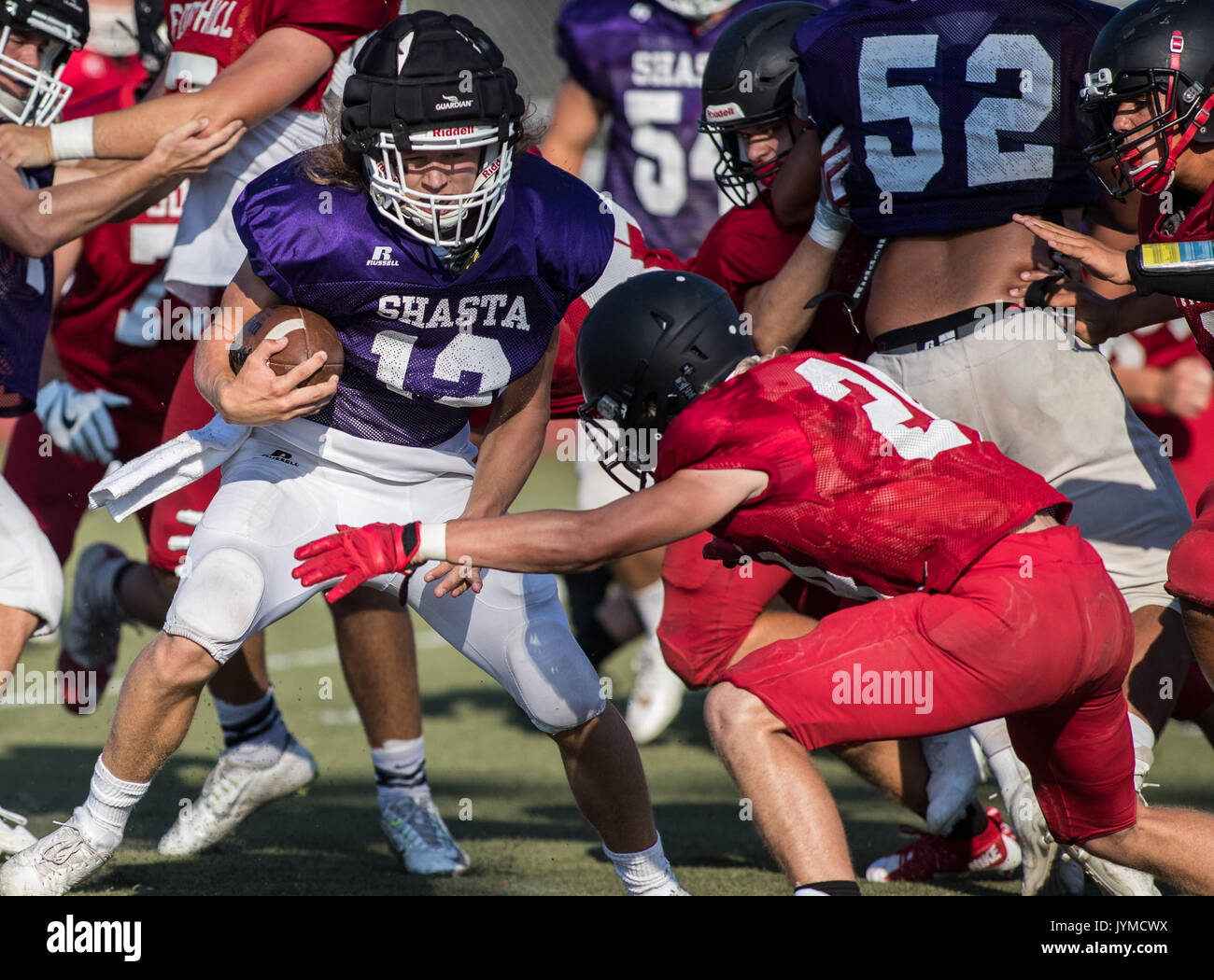 Football action with Shasta vs. Foothill High School in Palo Cedro, California. Stock Photo