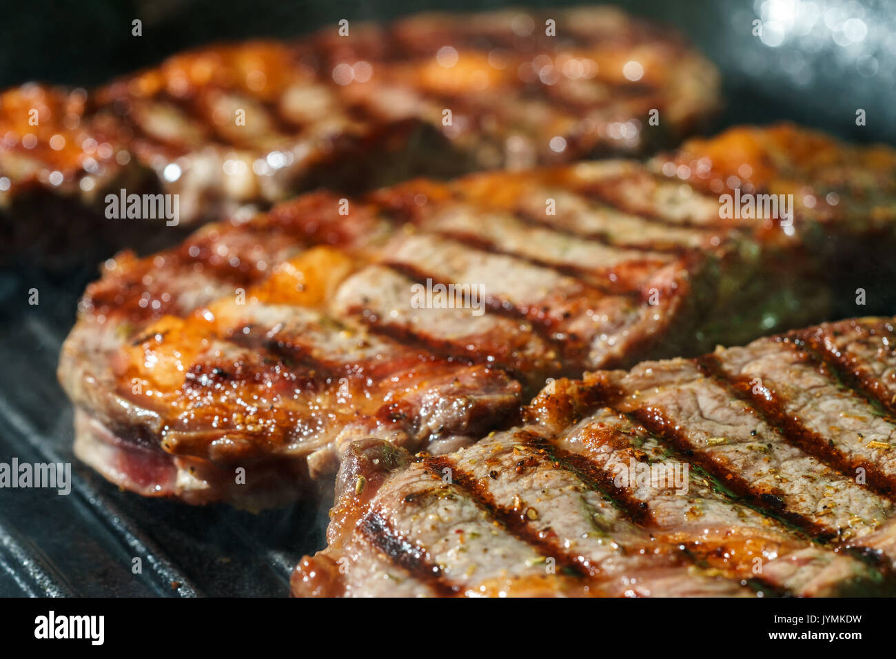 Ribeye Steak frying on grill pan.beef meat Stock Photo