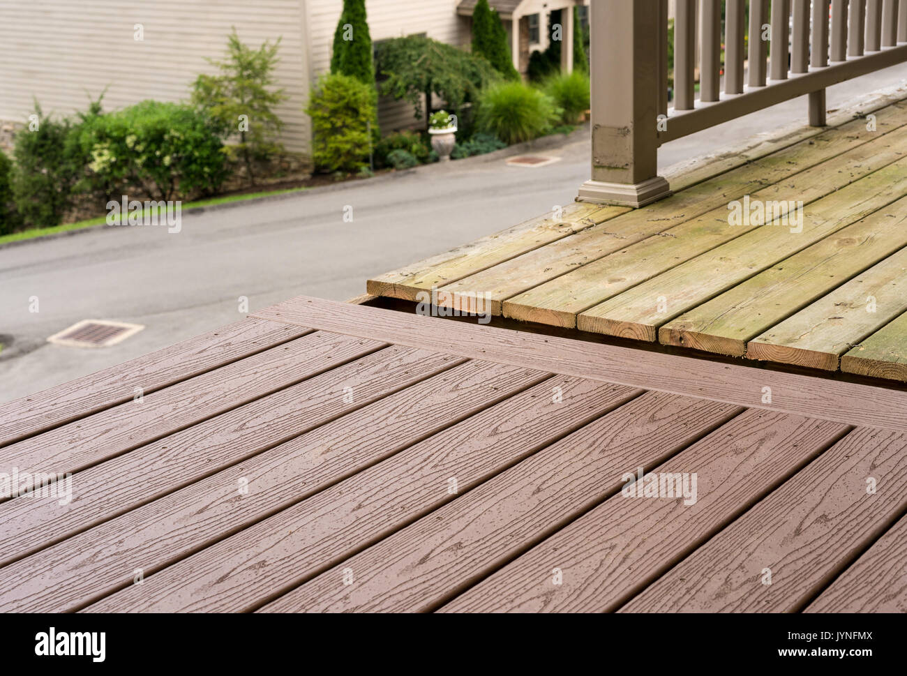 Replacement of old wooden deck with composite material Stock Photo