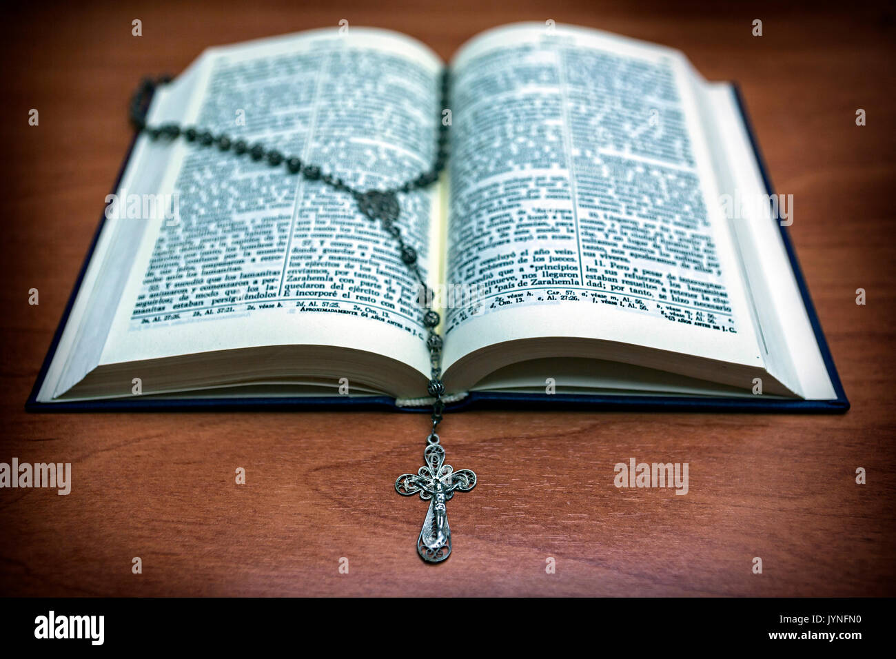 Rosary beads and a holy bible Stock Photo