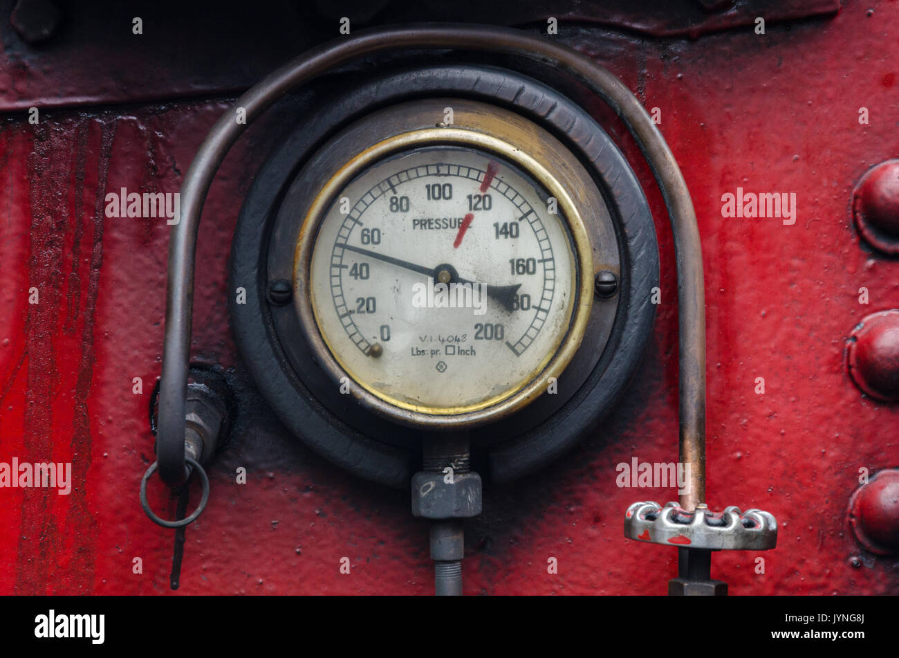A close up view of a pressure gauge on a steam engine Stock Photo - Alamy