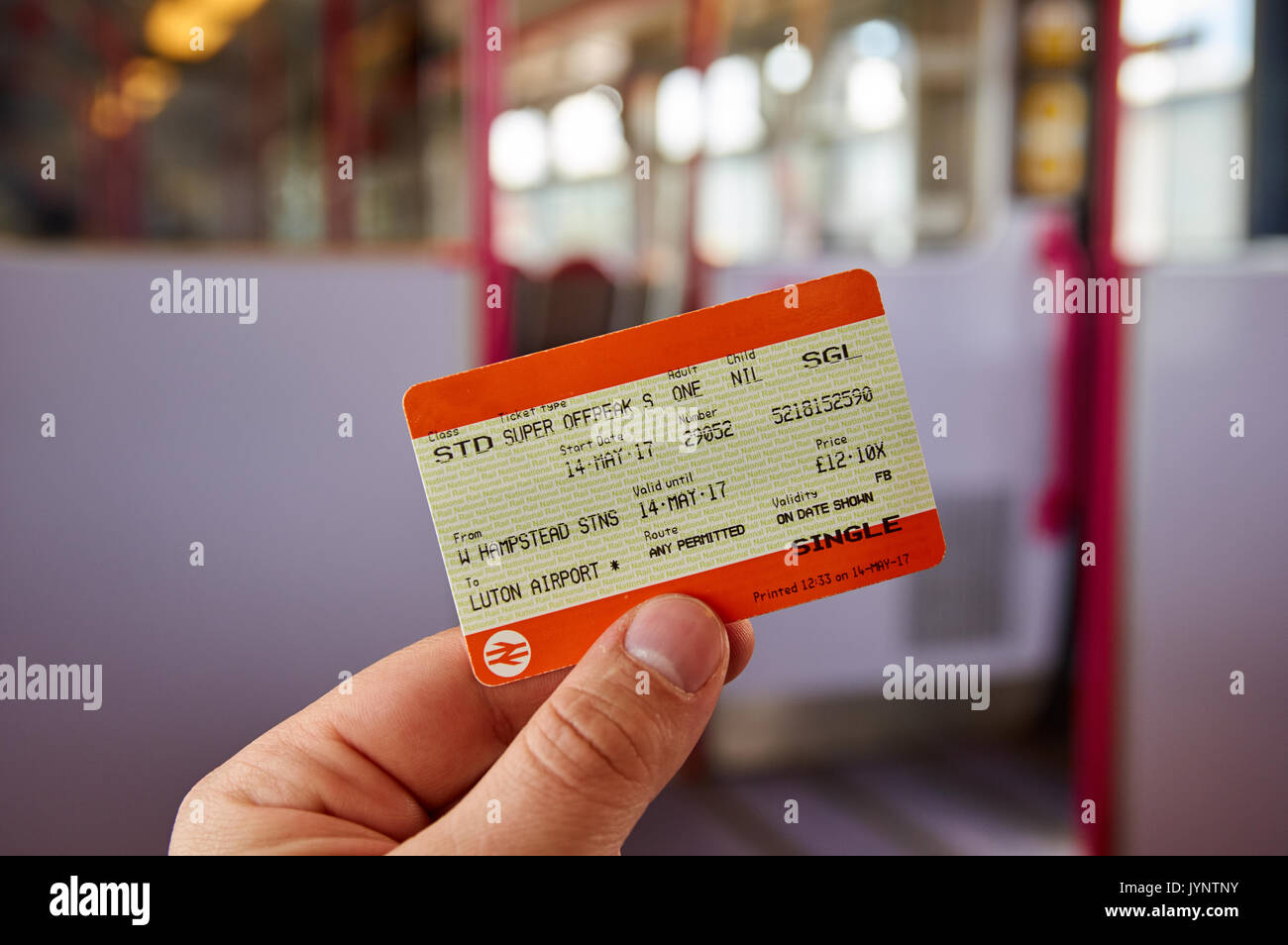 LONDON, ENGLAND - MAY 14, 2017 : UK Rail National single offpeak standard ticket. In the United Kingdom, National Rail is the trading name licensed fo Stock Photo