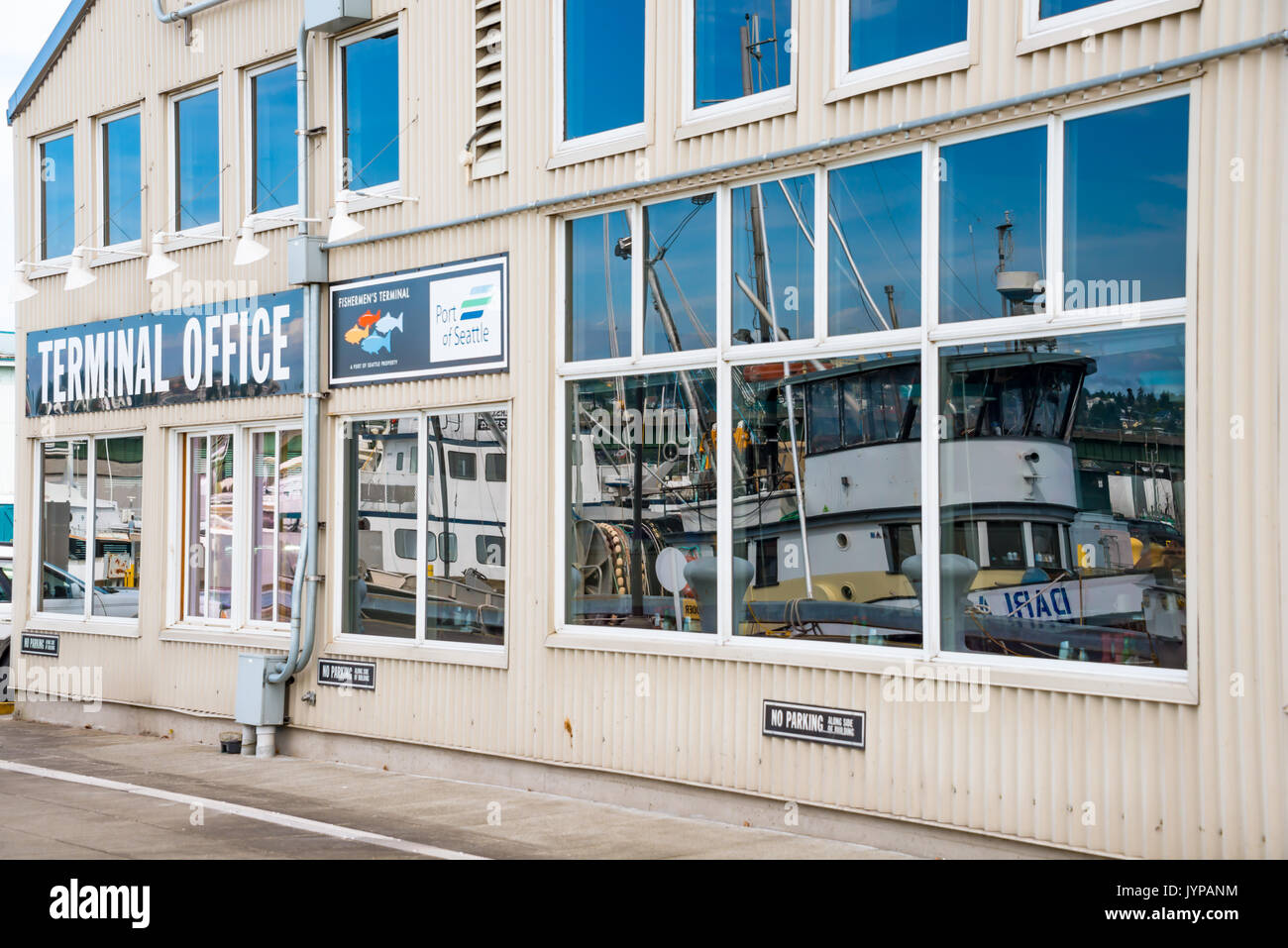 Reflection of Fishing Vessels in Port of Seattle Fishermen's Terminal