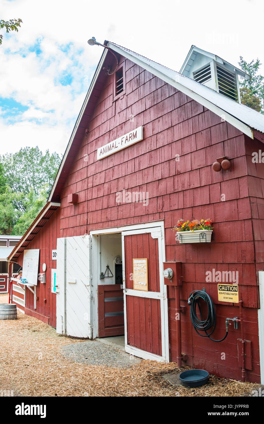 Red Barn at Educational Animal Farm Vertical Stock Photo