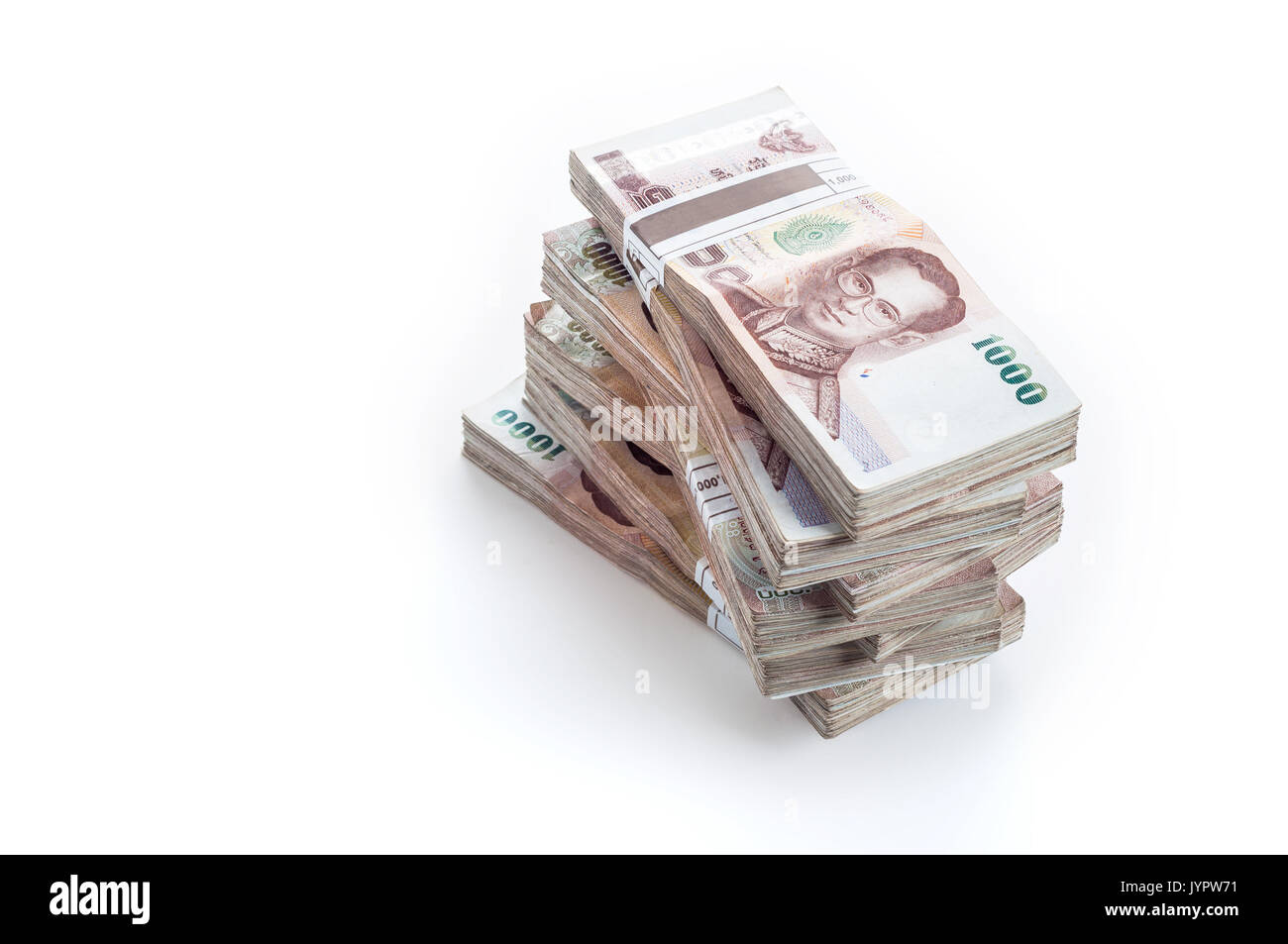Few pack of thailand money banknotes on white background Stock Photo