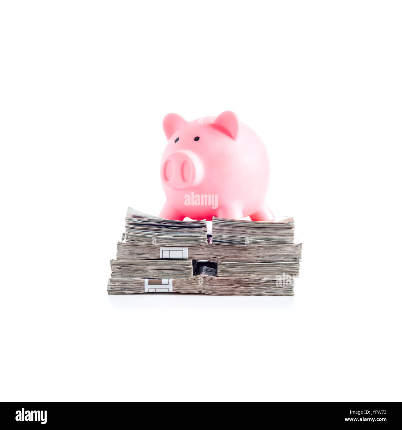 Pink piggy bank on heap of Thailand money banknotes. Concept of Income or investment business Stock Photo