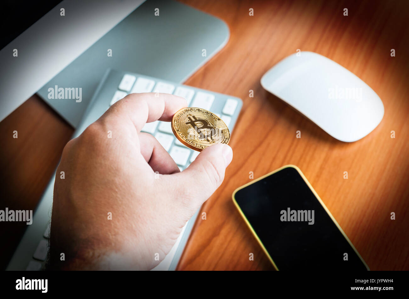 Man holds Bitcoin Stock Photo