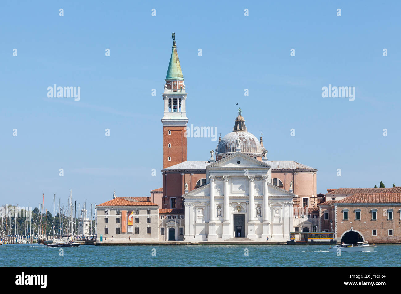 Basilica San Giorgio Maggiore  on Isolo San Giorgio Maggiore in the laggon at Basino San Marco, Venice, Italy an a sunny summer day. This Benedictine  Stock Photo