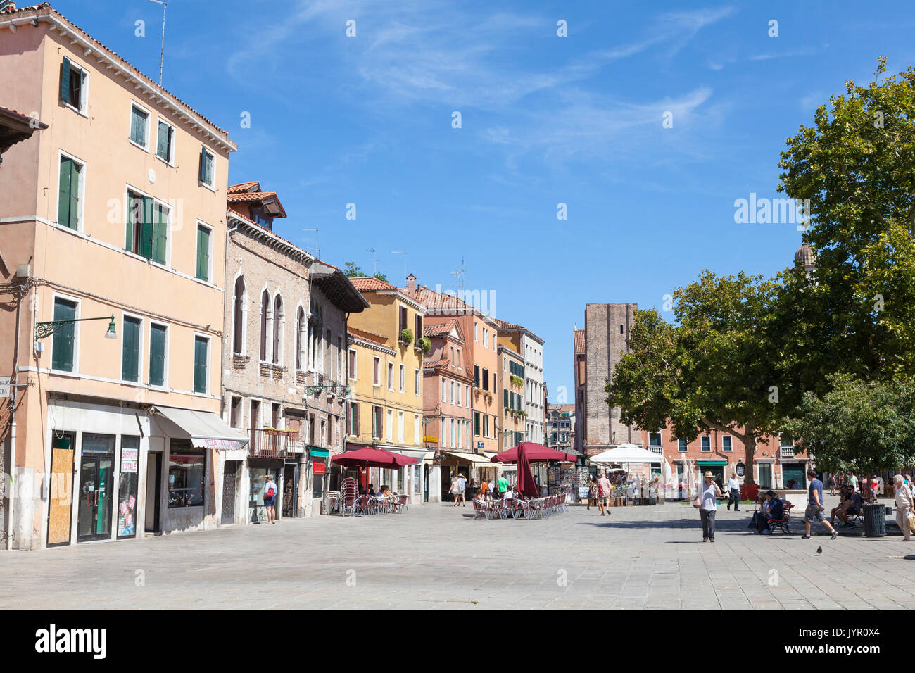 Campo Santa Margherita, Dorsoduro, Venice, Italy in summer  with few people around due to the intense heatwave and those tourists that are in the camp Stock Photo