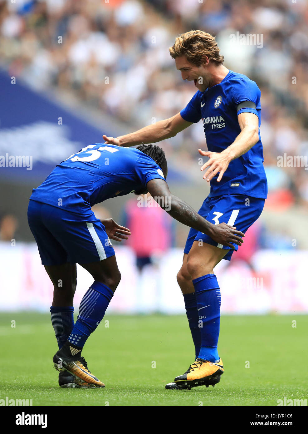 Alonso Goal Chelsea's Marcos Alonso (right) celebrates scoring his side's first ...
