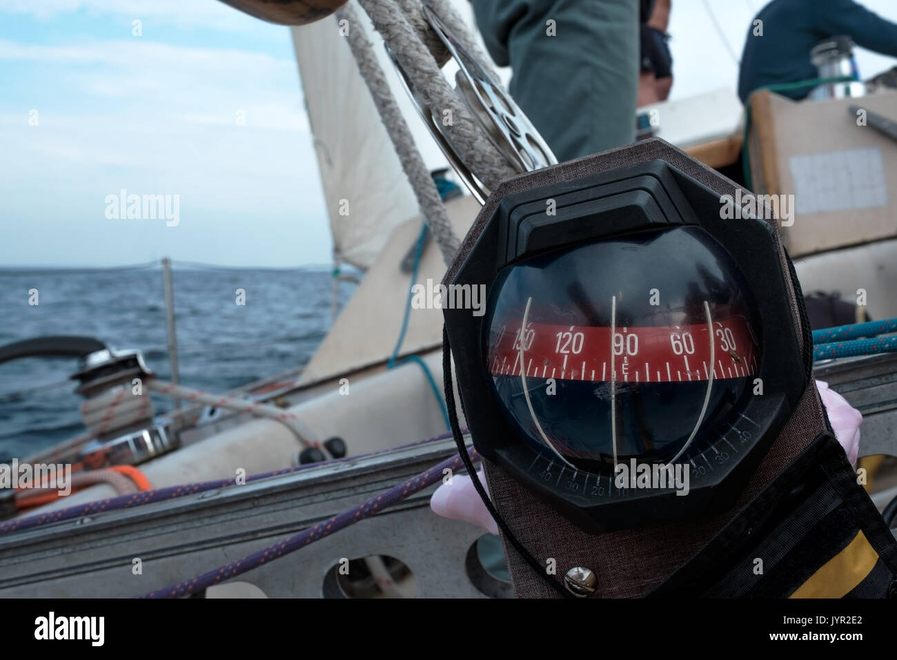 Compass on a yacht boat a blue summer sea ocean day Stock Photo