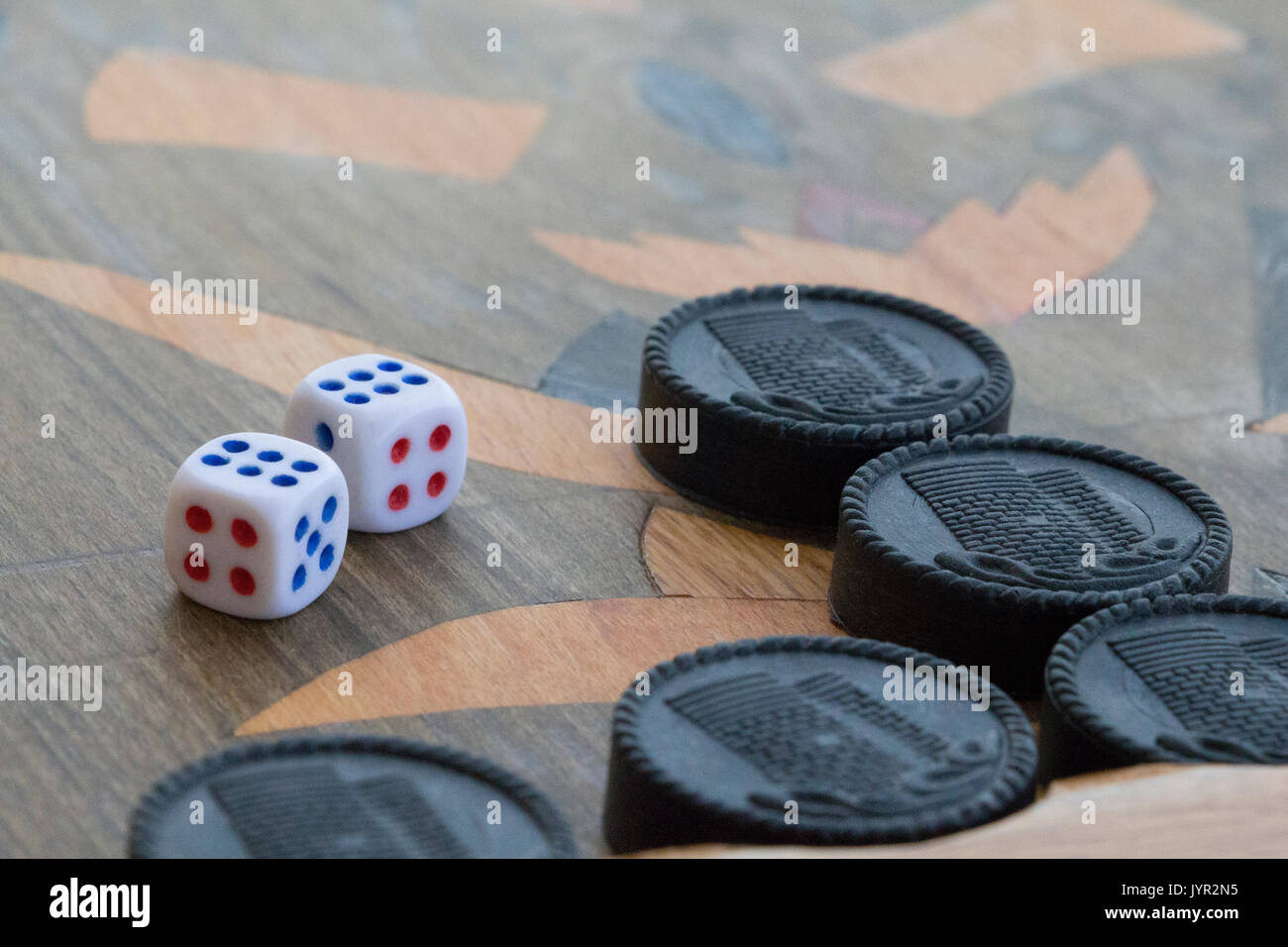 Board for a game of backgammon with two dice Stock Photo