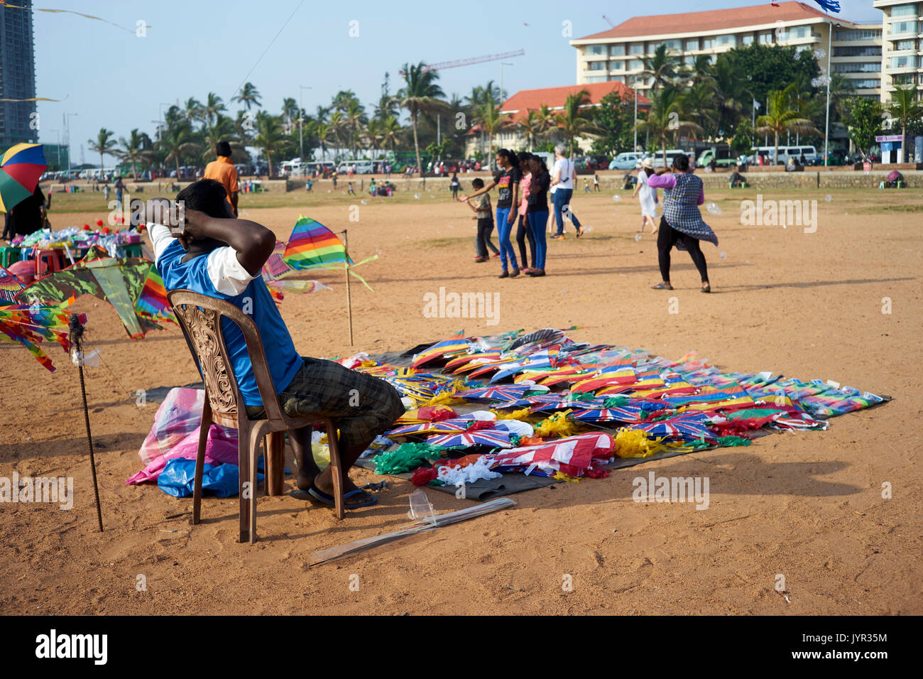 Street traders sell their goods on a sand surface in Sri Lanka Stock Photo