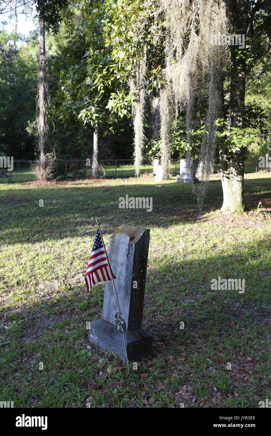 Tombstones in a historical cemetery near Ocala, Florida.  Many Confederate war veterans from the Civil War are buried here. Stock Photo