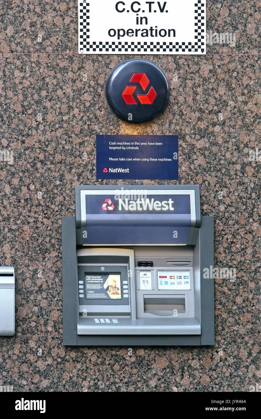LONDON, UK - February 09: NatWest ATM on urban street in London, UK - February 09, 2015; National Westminster Bank, commonly known as NatWest, is a la Stock Photo