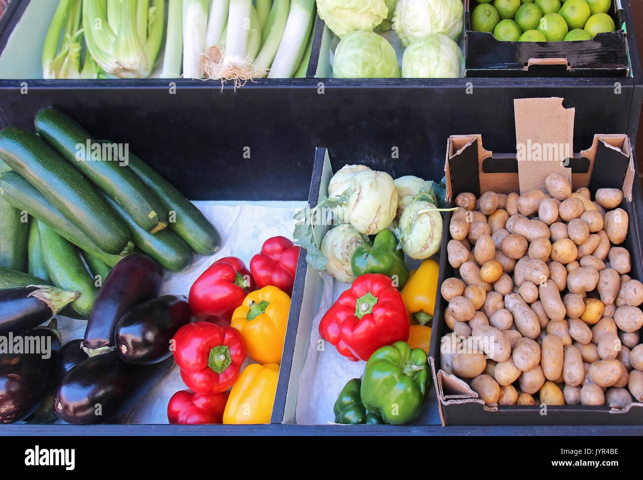 Organic fresh vegetables piles on market stall Stock Photo - Alamy
