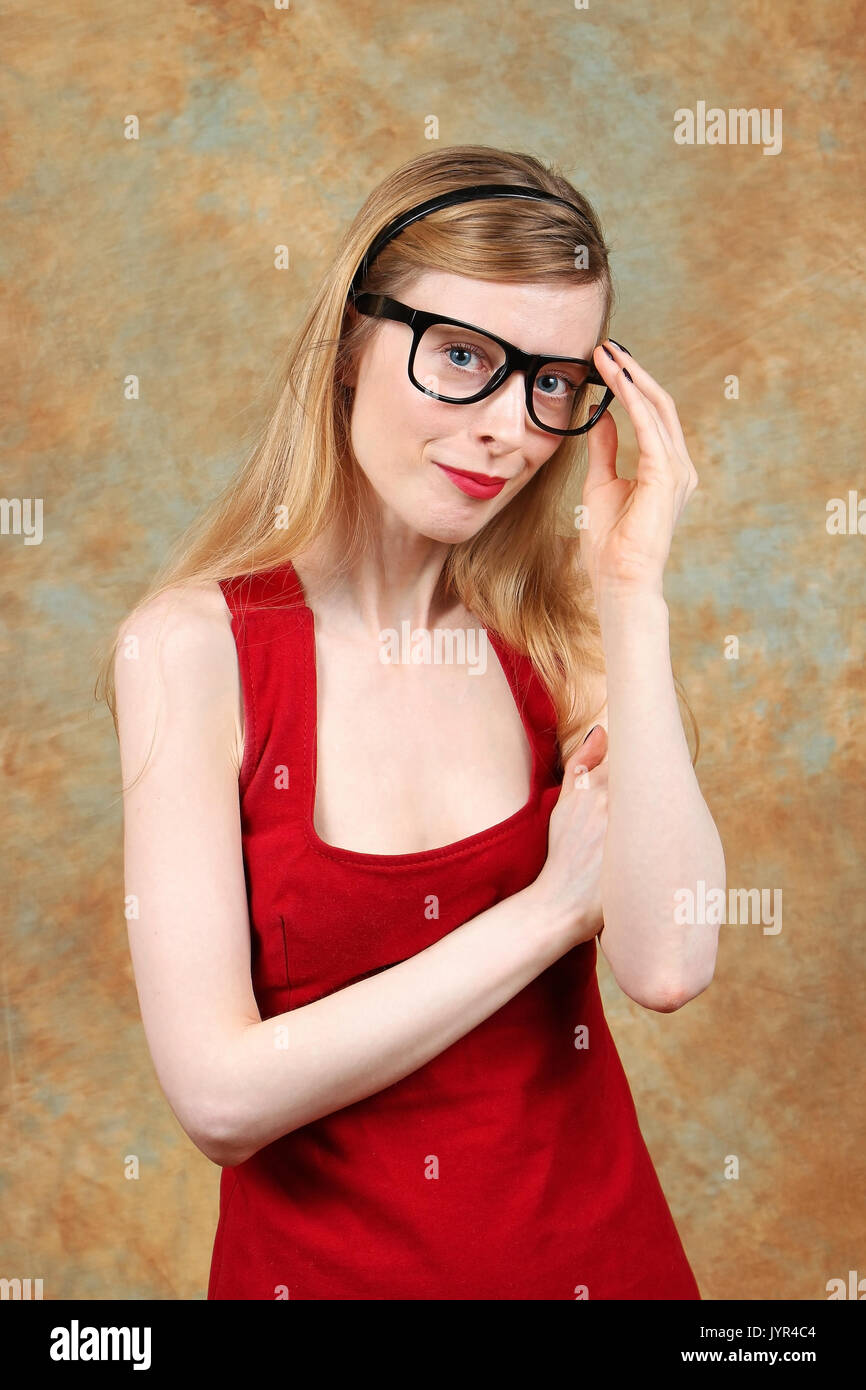 A young, blonde woman red dress hi-res stock photography and images - Alamy