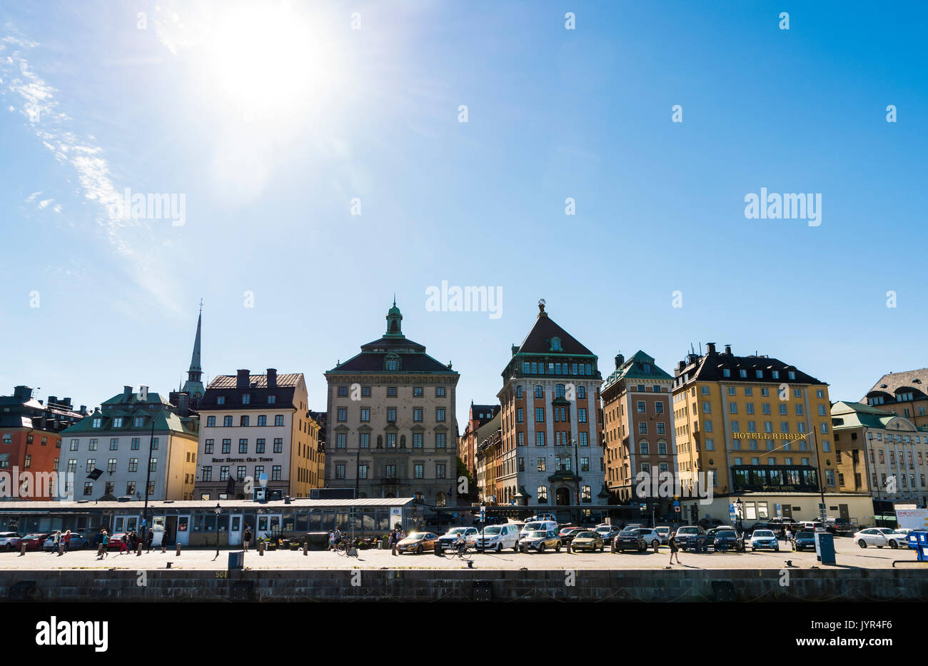 View of Skeppsbron, Gamla Stan, Stockholm, Sweden. Pretty quayside buildings on a sunny day. Stock Photo