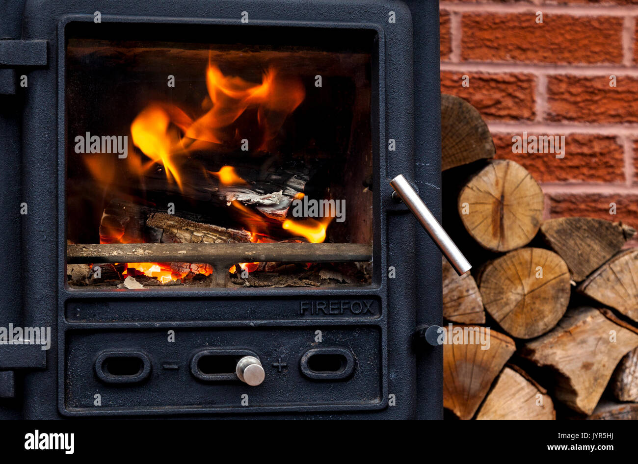 A Firefox wood burner in a home in the UK. Stock Photo