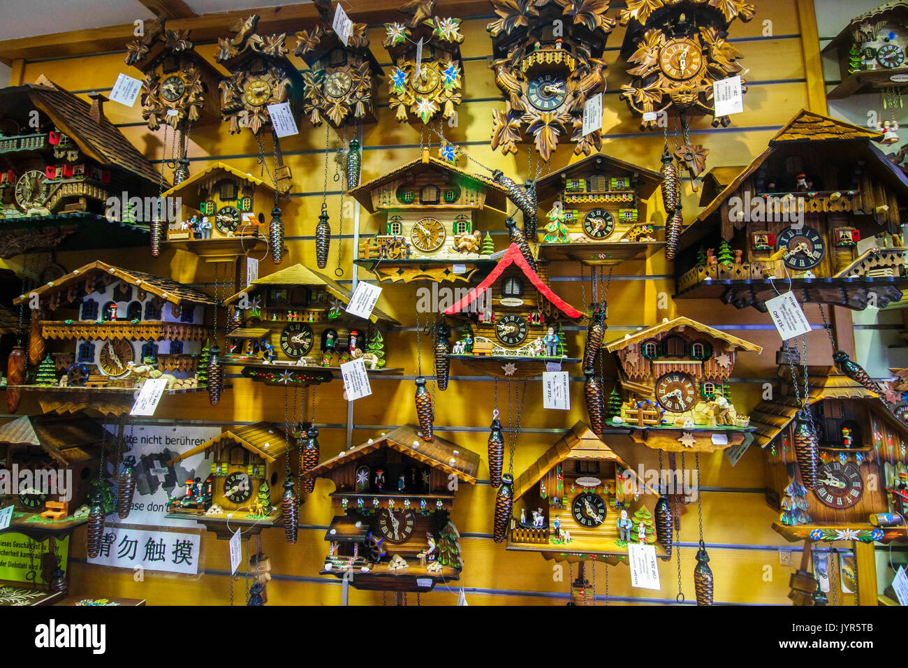 Souvenir shop in Zurich Switzerland with clocks and cow bells Stock
