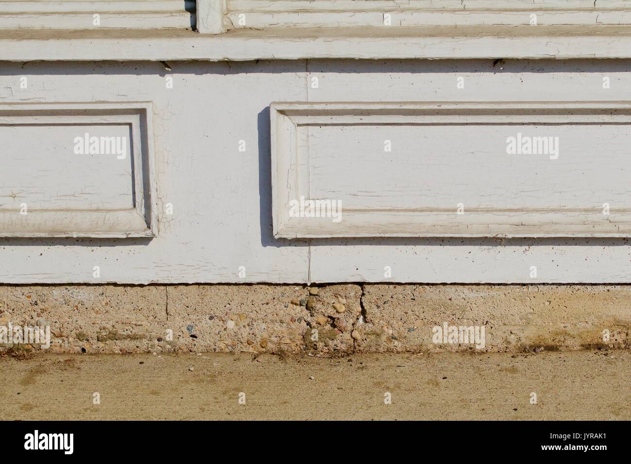 White wood molding on front of old brick building Stock Photo Alamy