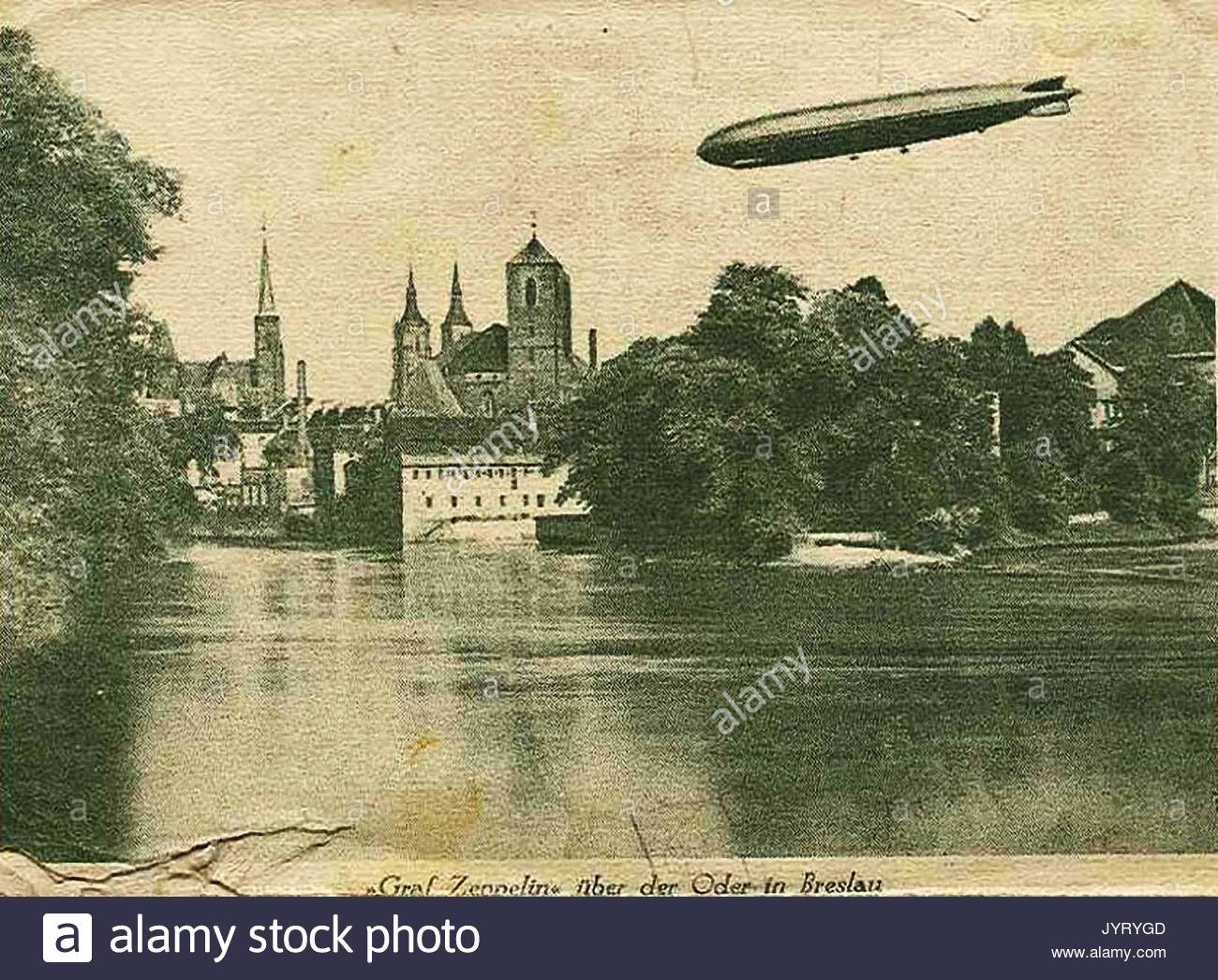 https://c8.alamy.com/comp/JYRYGD/old-photograph-showing-graf-zeppelin-flying-over-breslau-in-germany-JYRYGD.jpg
