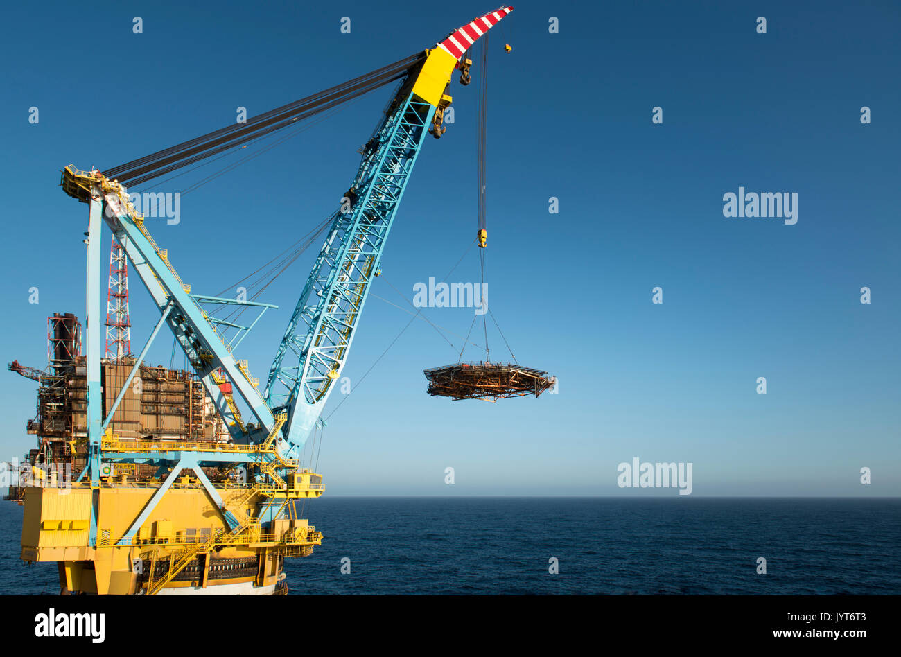 The Saipem S7000 heavy lifting vessel, removing a Helideck, off the BP Miller North Sea oil and gas platform credit: LEE RAMSDEN / ALAMY. Stock Photo