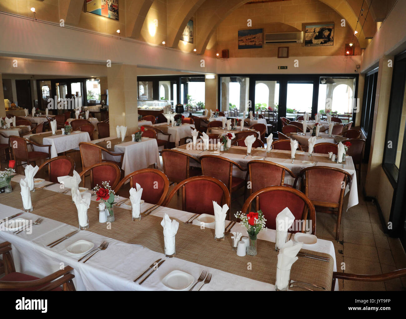Tables set ready in a restaurant in Malta Stock Photo Alamy