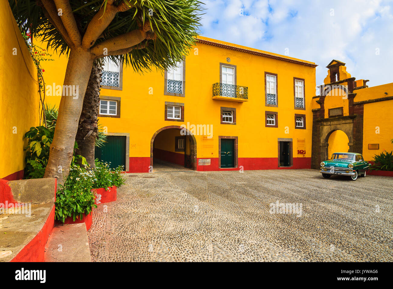 FUNCHAL, MADEIRA - AUGUST 25, 2016:  American old timer car parked on courtyard of military museum in old castle Fortaleza de Sao Tiago in Funchal. Stock Photo