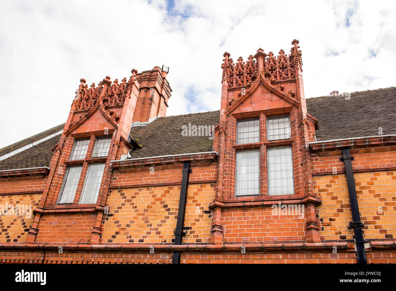 Intricate stonework in Port Sunlight Village, founded by soap king William Hesketh Lever in 1888, to offer a better quality of life to factory workers Stock Photo