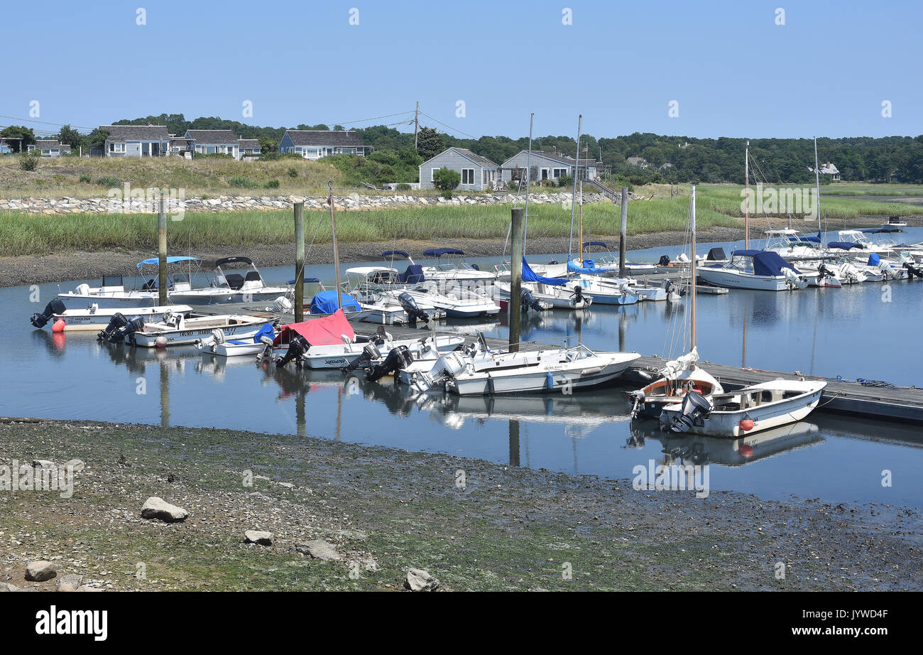 Summer rentals and the docks in Wellfleet Harbor Cape Cod Stock Photo