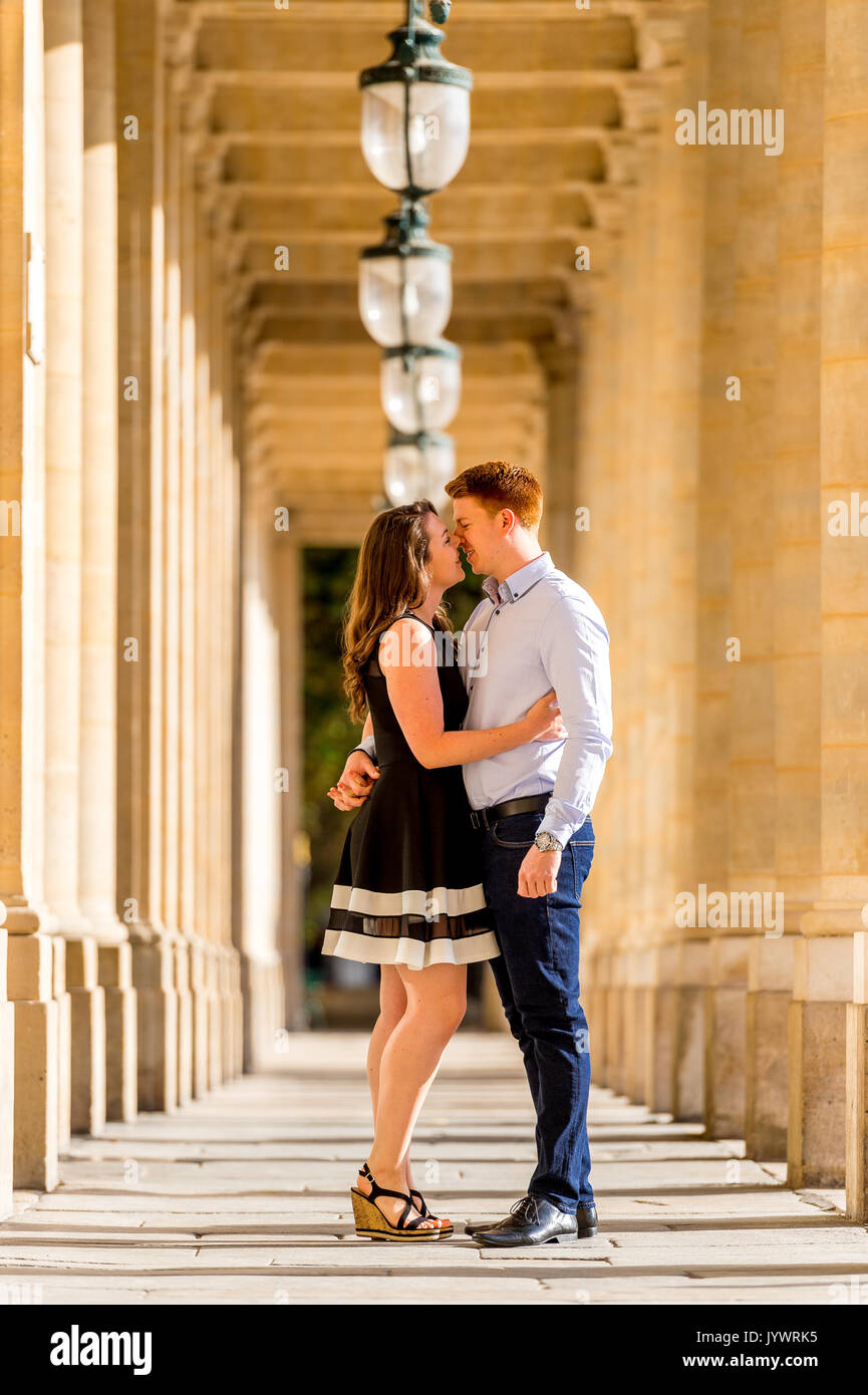 Couple kissing at the Palais Royal Stock Photo