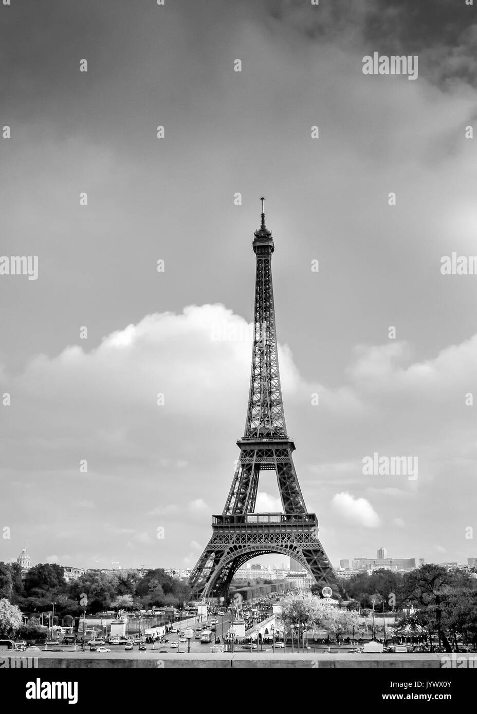 A black and white view of the Eiffel Tower on a sunny day in Paris, France Stock Photo