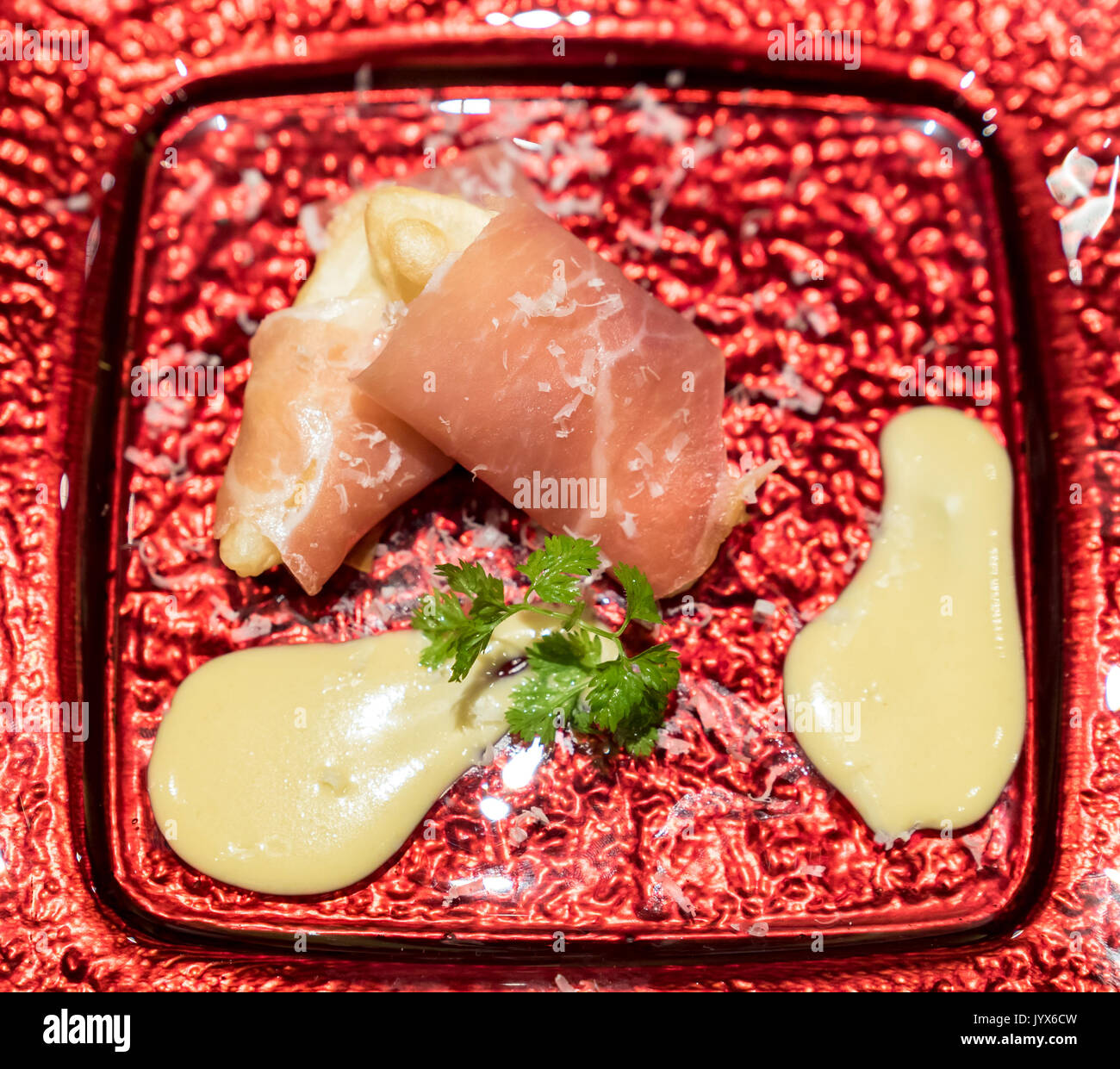 Arranged small ball Deep fried European pear tempura with Prosciutto