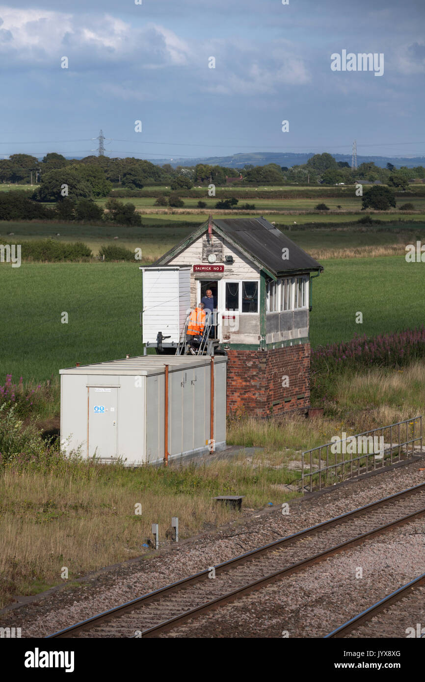 Signaller arriving for shift change at  Salwick signal box on the Preston - Blackpool line Stock Photo