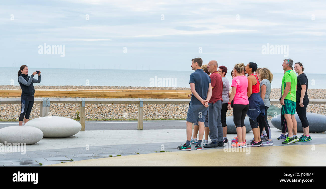 Taking photos of a group of people. Stock Photo