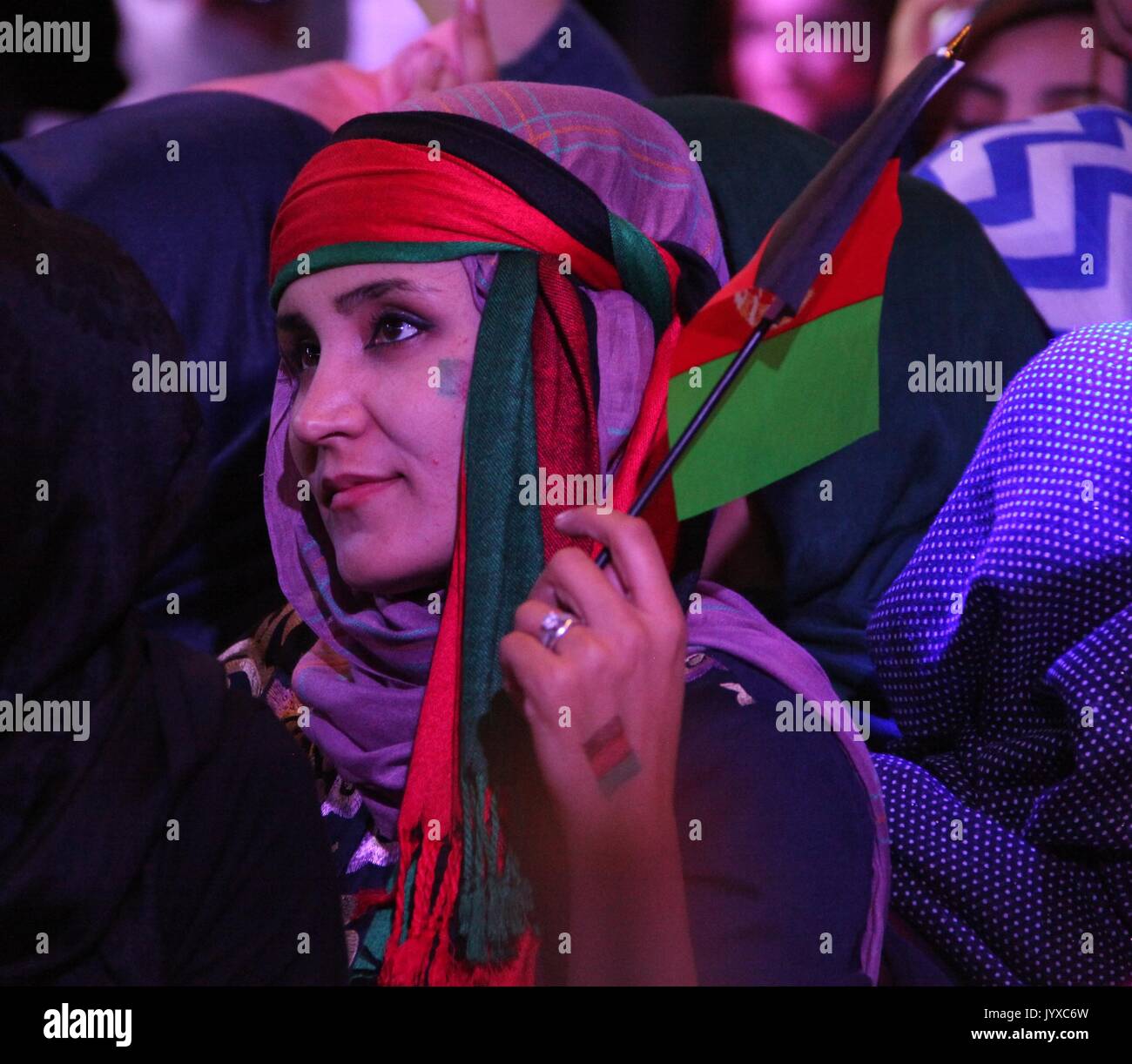 Kabul, Afghanistan. 19th Aug, 2017. An Afghan girl attends a concert to
