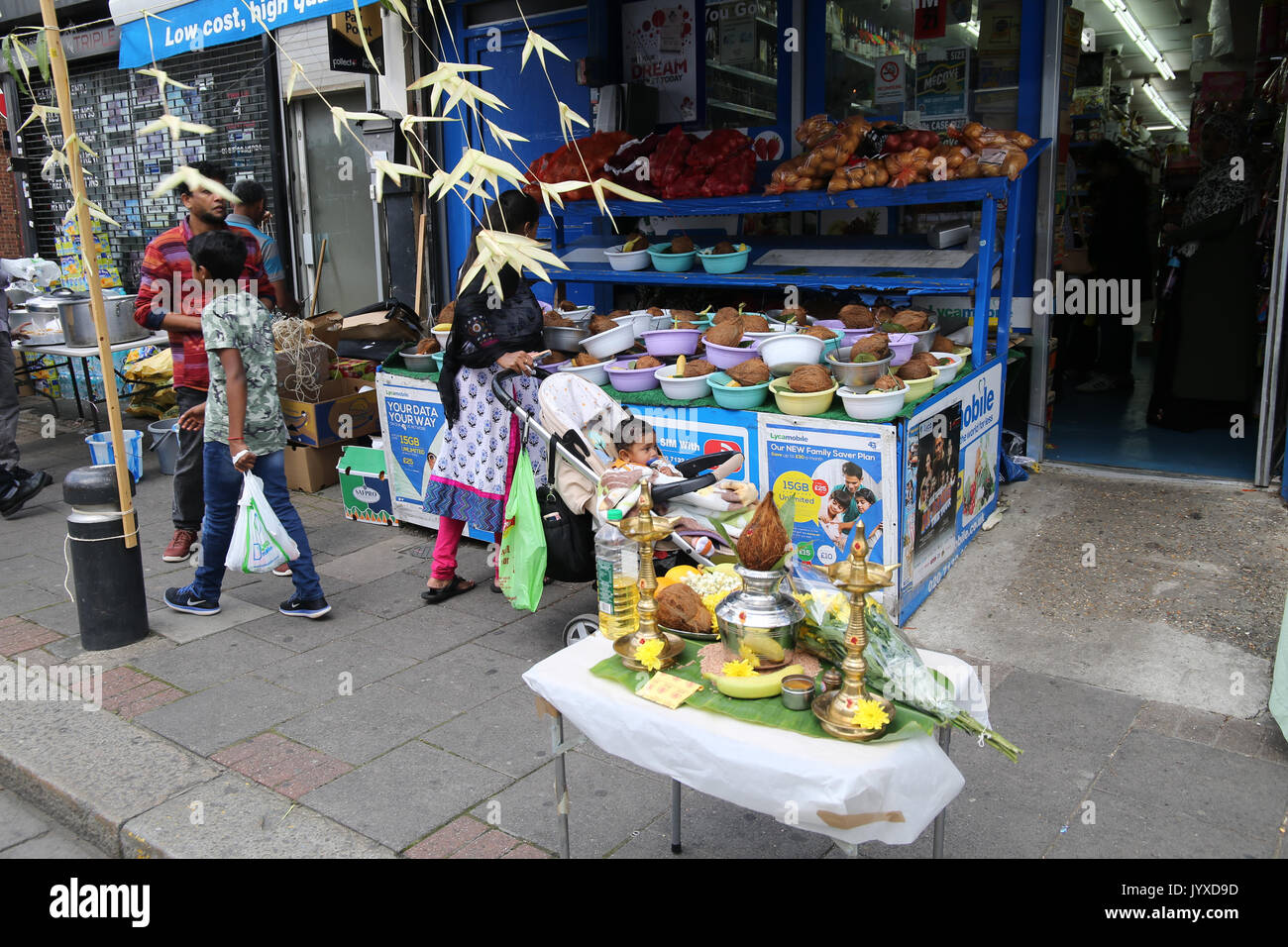 London, UK. 20th Aug, 2017. Street vendors setting up business opposite the London Sri Murgan Temple where large crowds congregated to celebrate the Chariot Festival Credit: Paul Quezada-Neiman/Alamy Live News Stock Photo