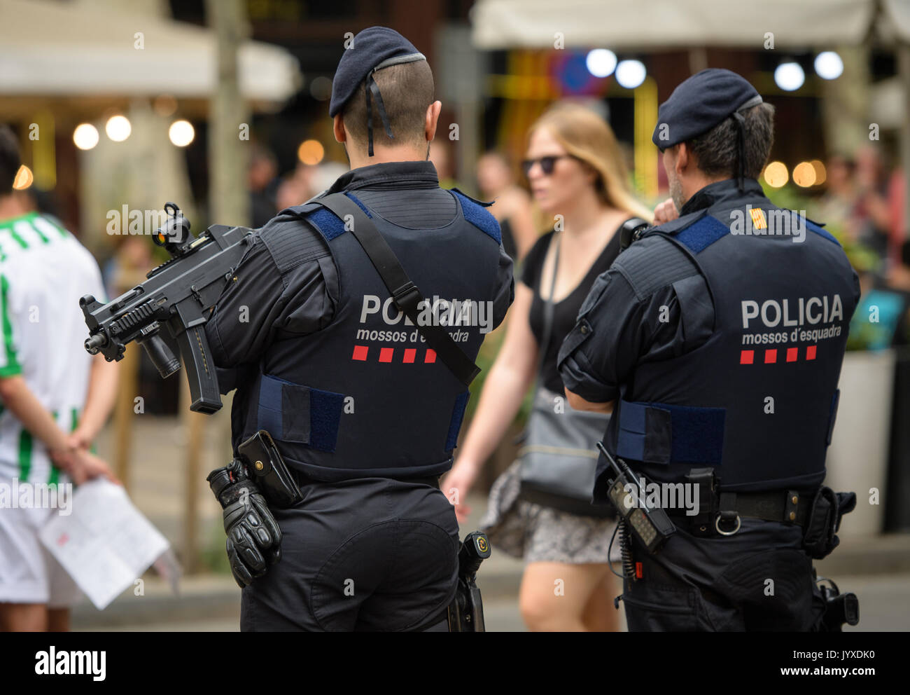 Barcelona, Spain. 19th Aug, 2017. Armed police officers patrol the Las  Ramblas in Barcelona, Spain, 19 August 2017. Several people were killed and  others injured in a terror attack on the popular