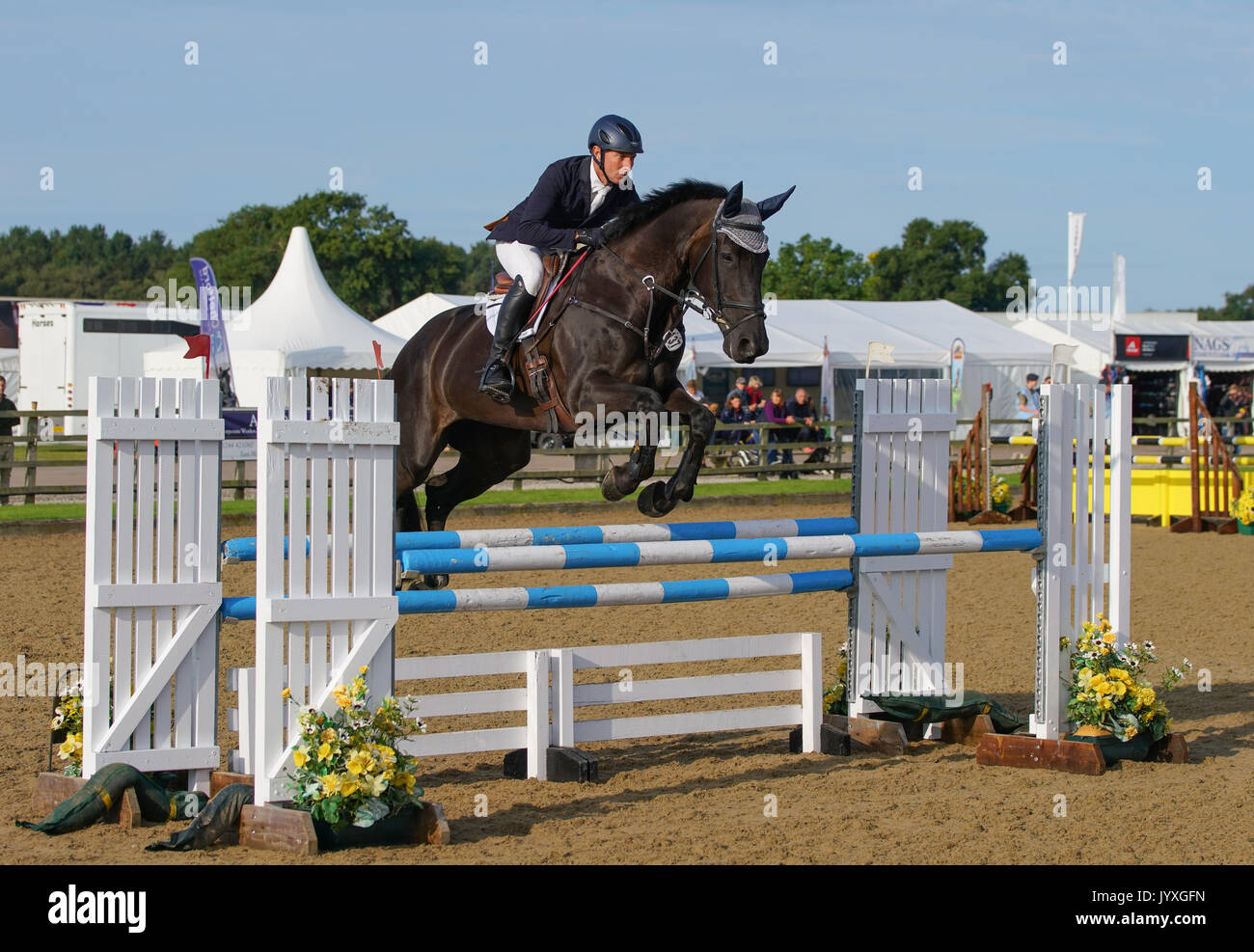 Congleton, UK. 20th Aug, 2017. Somerford Park International horse trials, Sunday, day 3, riders compete in the British eventing CIC* and CIC** Show jumping and cross country. Credit: Scott Carruthers/Alamy Live News Stock Photo