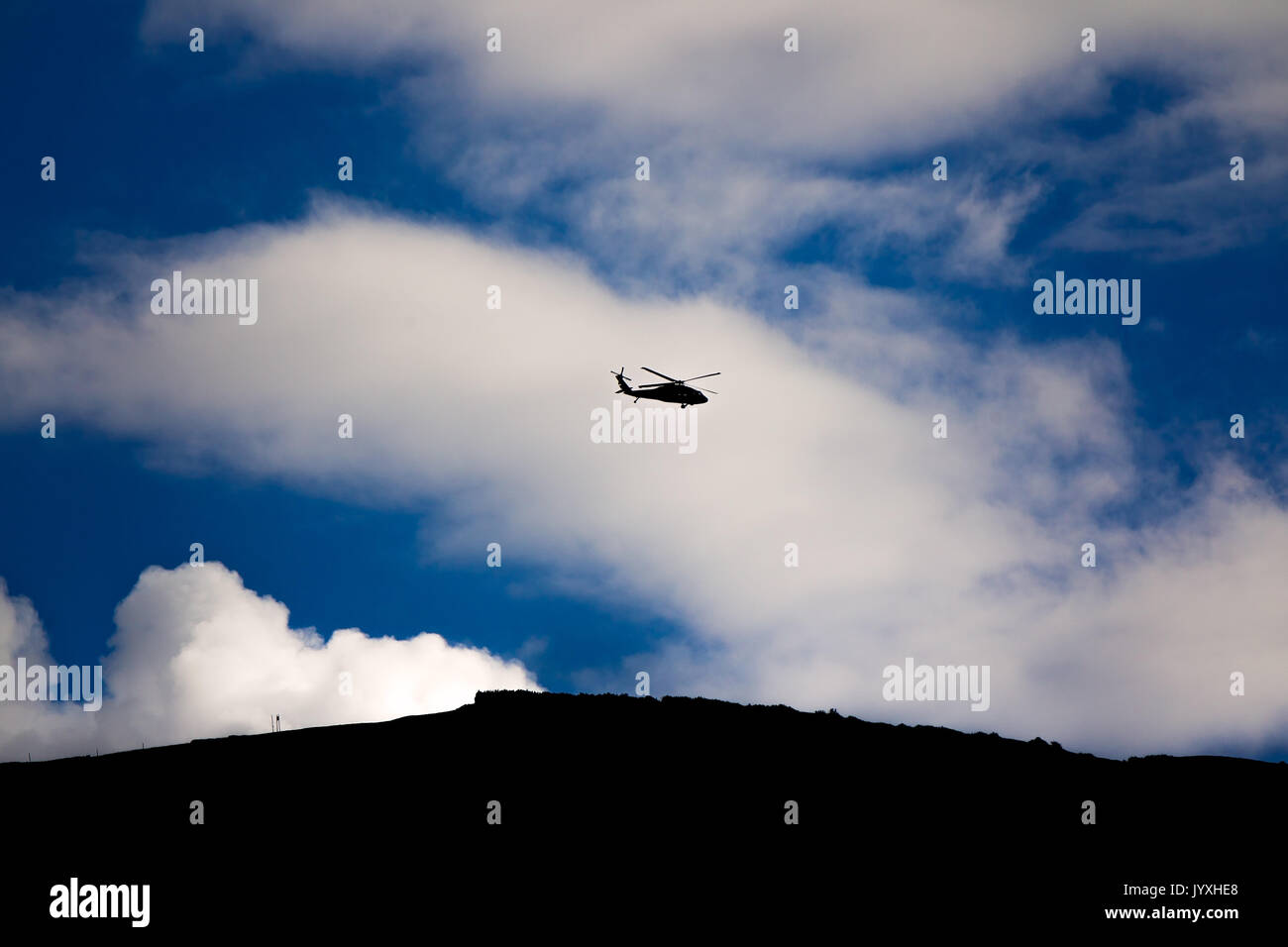 Aspen, Colorado, USA. 11th Aug, 2016. A Black Hawk helicopter flies above the Roaring Fork Valley in Aspen, Colorado. Credit: Alex Edelman/ZUMA Wire/Alamy Live News Stock Photo