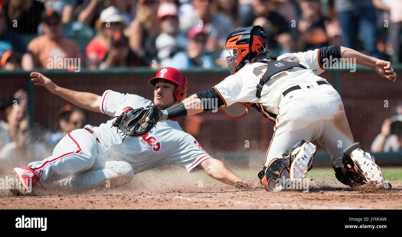 San Francisco, USA. 20th Aug, 2017. San Francisco Giants catcher Buster Posey (28) tagging out Phillies left fielder Cameron Perkins (30), during the seventh inning of a MLB game between the Philadelphia Phillies and the San Francisco Giants at AT&T Park in San Francisco, California. Credit: Cal Sport Media/Alamy Live News Stock Photo