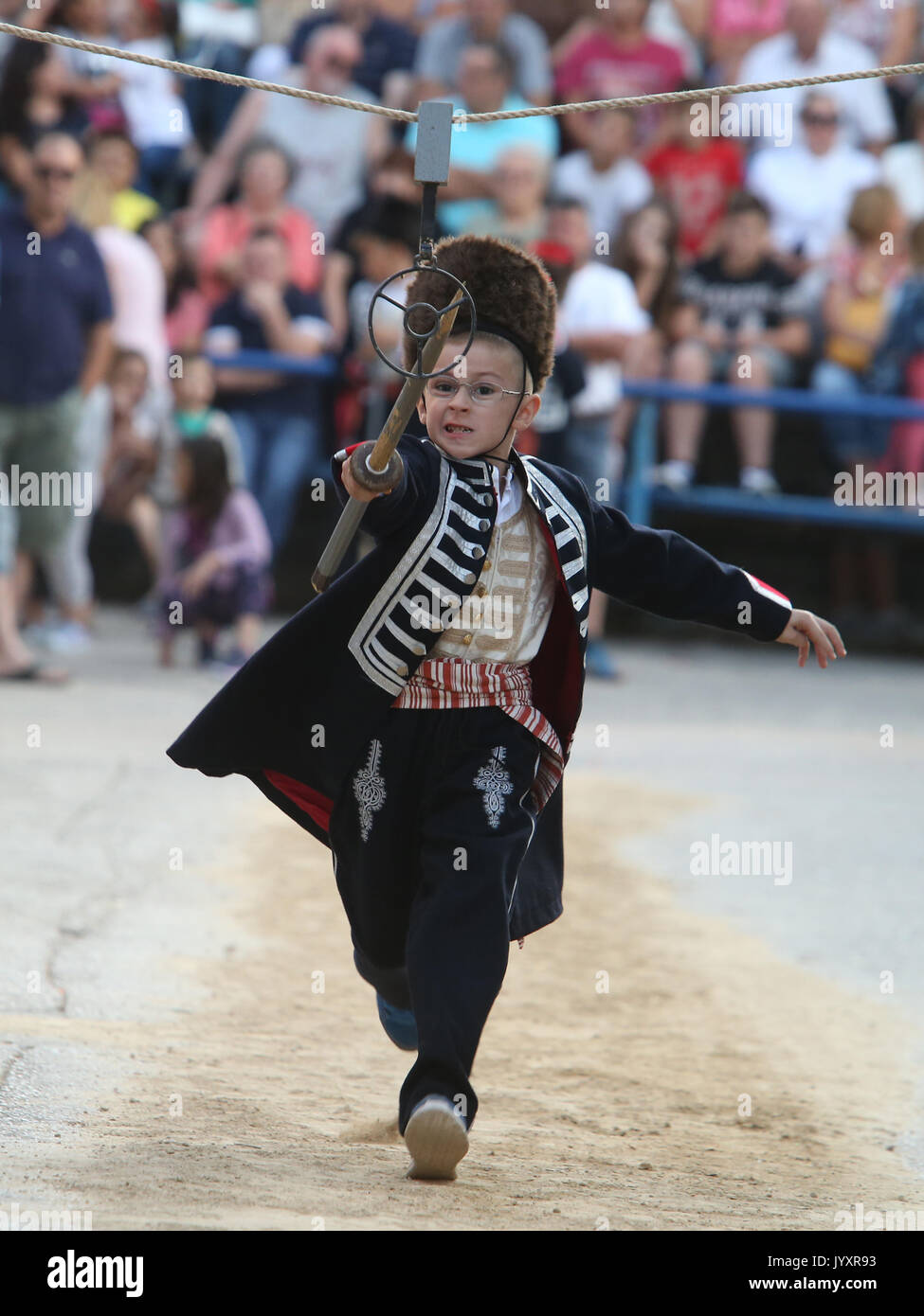 (170821) -- VUCKOVICI (CROATIA), Aug. 21, 2017 (Xinhua) -- A Boy participates in the Children's Alka lancing tournament in the village of Vuckovici, Croatia, on Aug. 20, 2017. Children's Alka is a lancing tournament held every August for boys up to ten years old since 1955 to commemorate their brave ancestors who defeated the Ottomans in 1715. (Xinhua/Ivo Cagalj) (zcc) Stock Photo