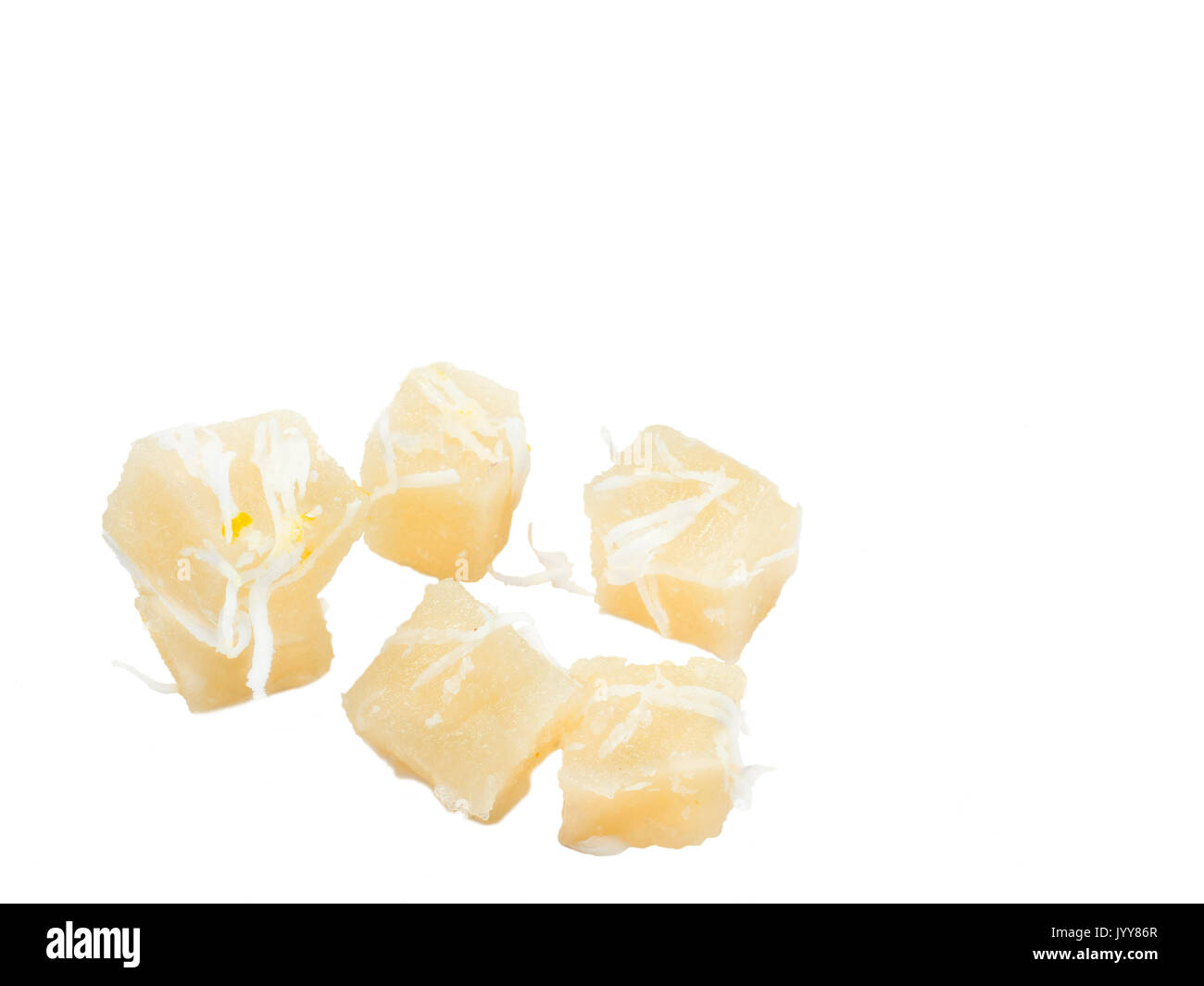Sweet cassava cake with young coconut sliced isolated on white background Stock Photo