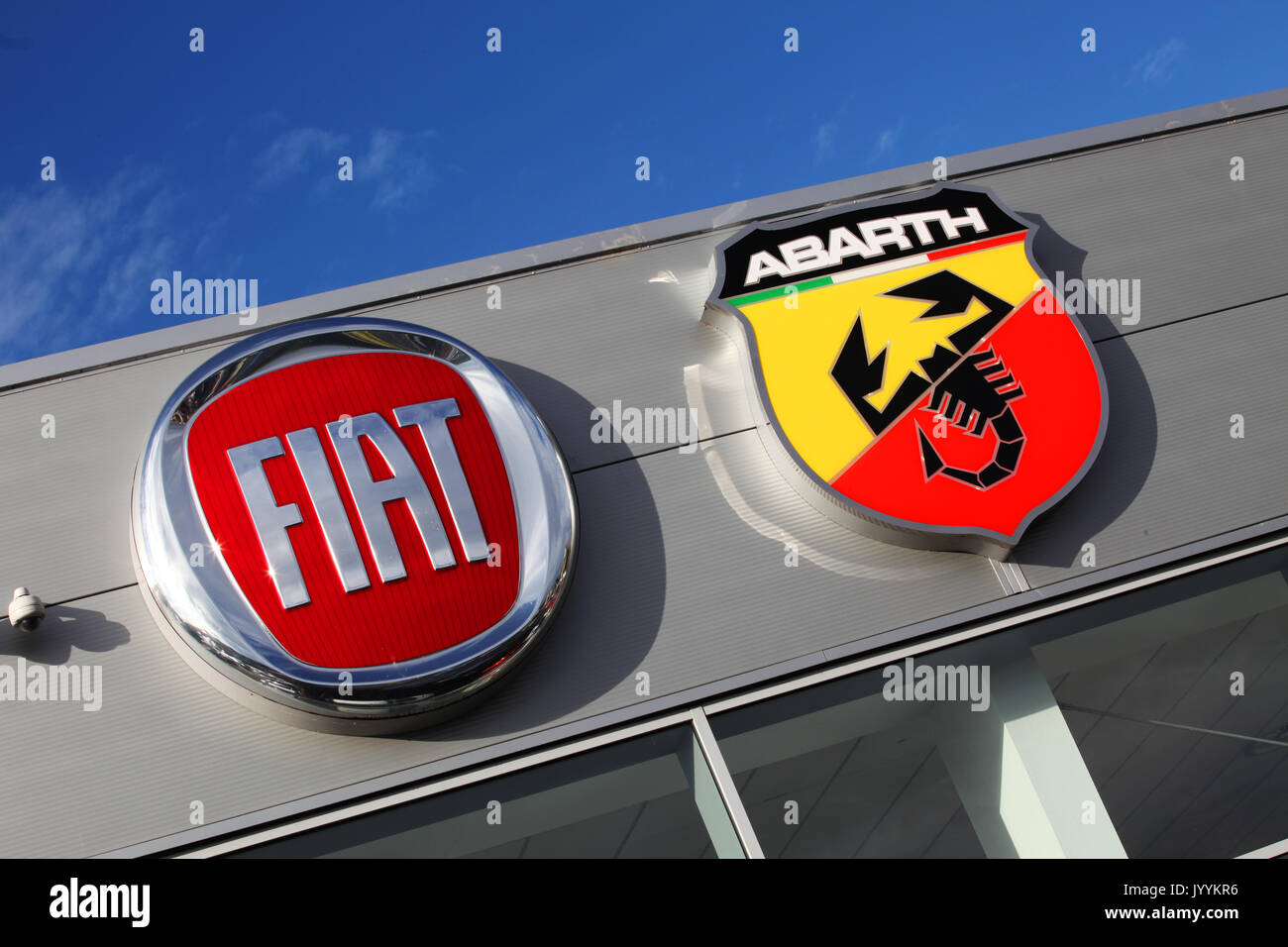 fiat and abarth badges above a dealer showroom Stock Photo Alamy
