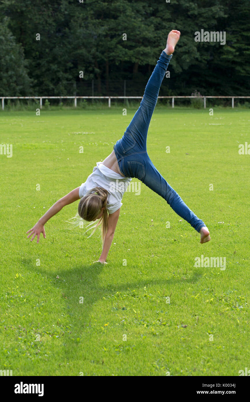 Girl Doing A Cartwheel High Resolution Stock Photography and Images Alamy