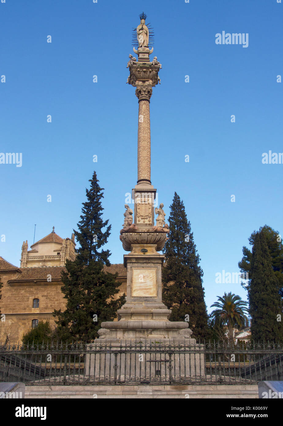 GRANADA, SPAIN MARCH 10, 2016 Statue on column in the Triunfo
