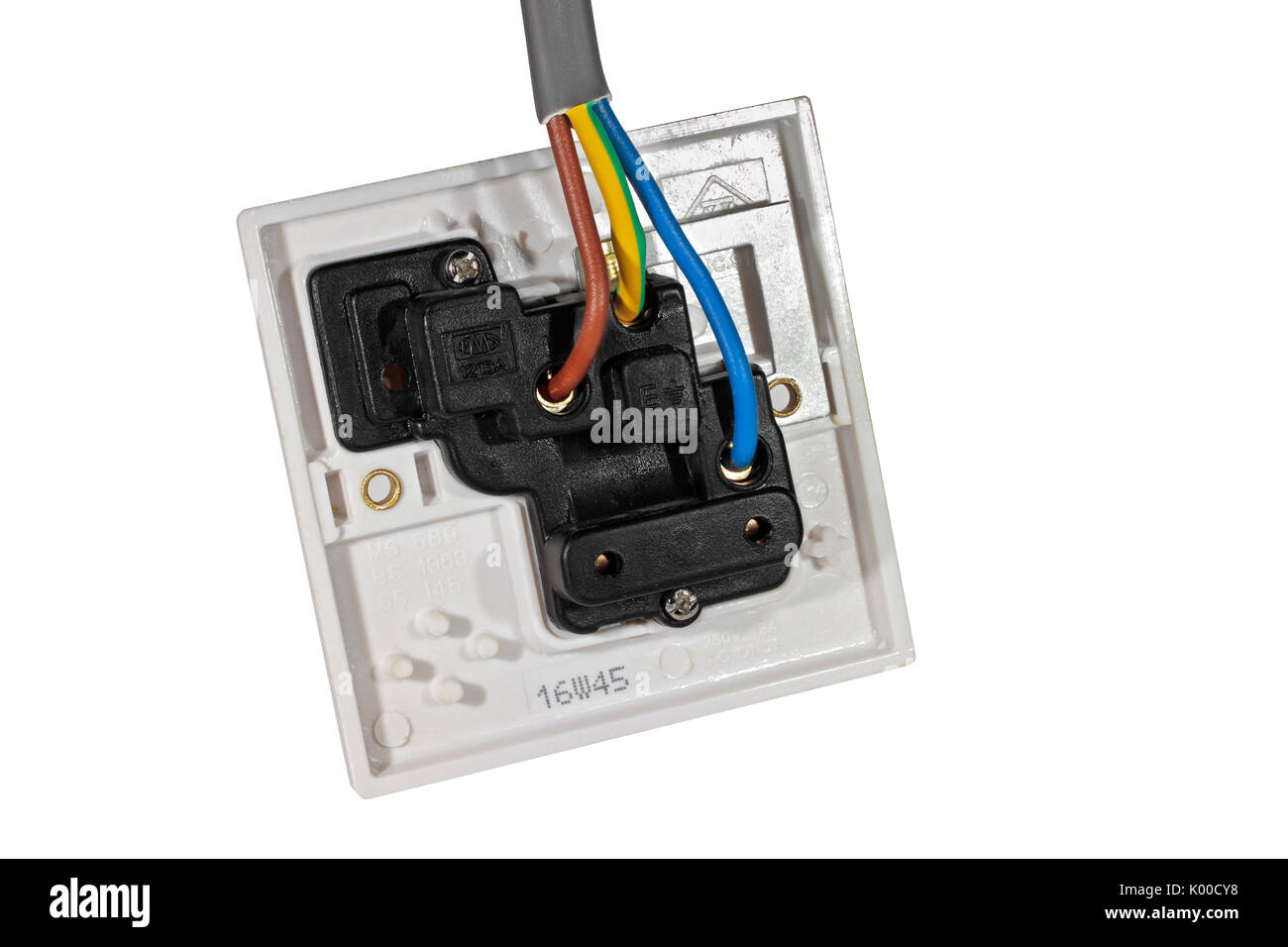 A 250v 13A Electrical Socket Outlet viewed from behind showing wiring isolated on a white background Stock Photo