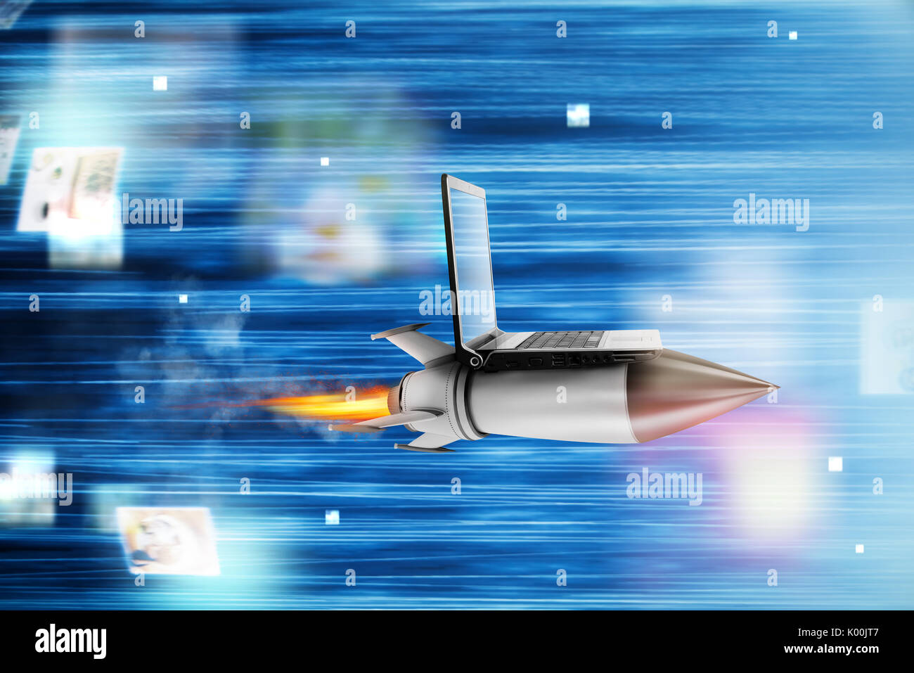 Fast internet concept with a laptop over a rocket Stock Photo