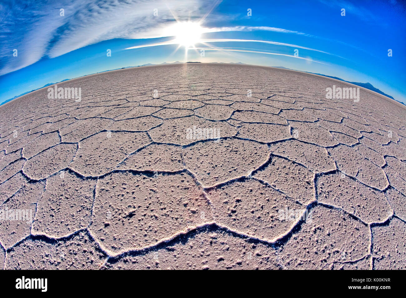 The curvature of the earth is accentuated by fish eye effect in the huge expanse of salt in the Salar de Uyuni. South Lipez. Bolivia. South America Stock Photo